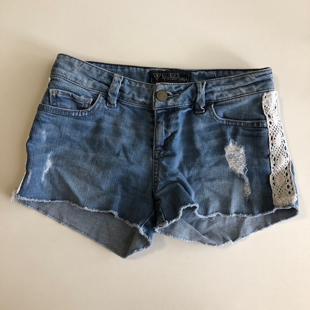 Guess Women’s Jeans Mid Rise Med Wash Blue Distressed Denim CutOff Shorts Sz 24